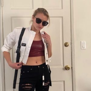 White LF jacket with buckles.